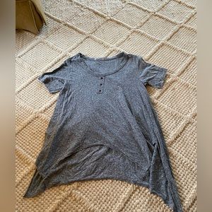 Blue and white distressed top. Size medium.